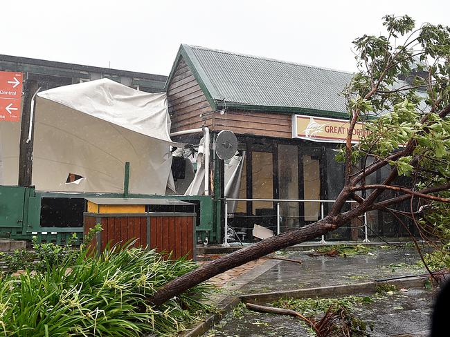 Shops have been trashed on the main street of Airlie Beach during Cyclone Debbie. Picture: Alix Sweeney