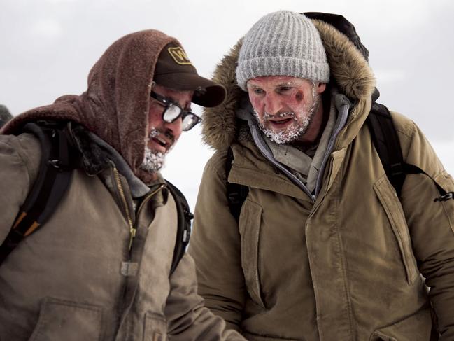 Liam Neeson (right) stars in <i>The Grey</i>.