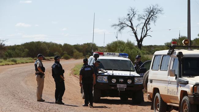 Police during the search for SA health worker Gayle Woodford a few kilometres out of Fregon in the APY Lands. Picture: Simon Cross