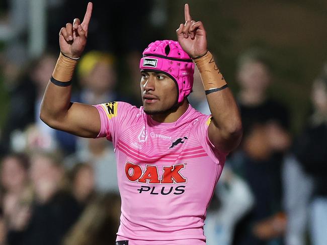 SYDNEY, AUSTRALIA - AUGUST 10:  Stephen Crichton of the Panthers celebrates scoring a try during the round 24 NRL match between Manly Sea Eagles and Penrith Panthers at 4 Pines Park on August 10, 2023 in Sydney, Australia. (Photo by Mark Metcalfe/Getty Images)