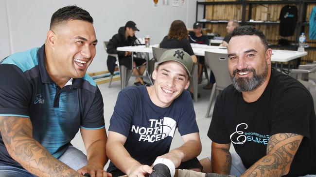 Joseph Te Puni-Fromont, left, with student Kaiden Martin-Fierro and Steve Henry, right, at their premises in Ormeau. Picture: Tertius Pickard