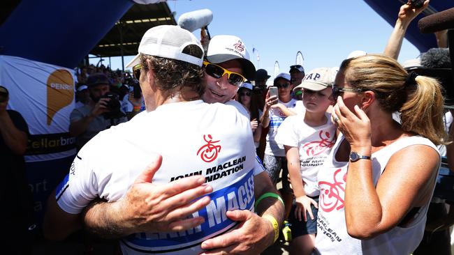 John Maclean is congratulated by Steve Waugh and his wife Amanda and son Jack. (Brett Costello)