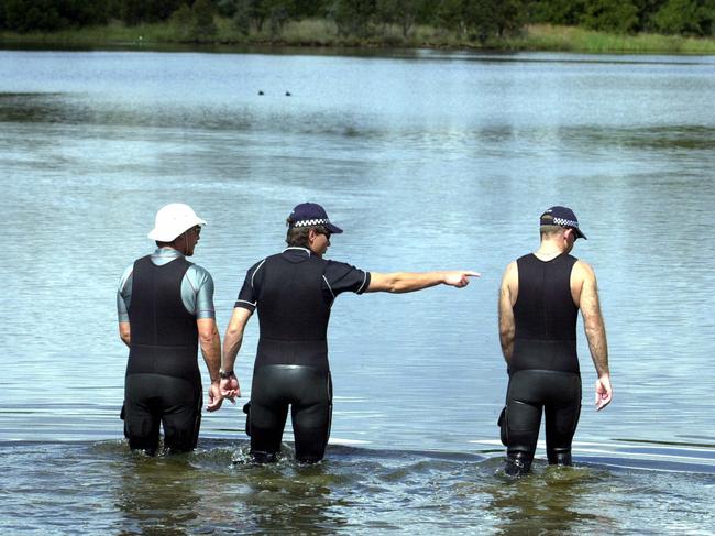 Police search a pond in the Gunghalin area for clues after Kathryn Grosvenor’s body was found. Picture: John Feder