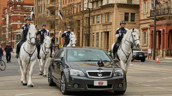 The Governor drives to Parliament House for the proclamation of King Charles III. Picture: Matt Loxton