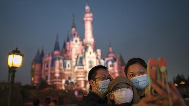 Tourists visit Shanghai Disneyland after its reopening on May 11. Picture: Getty