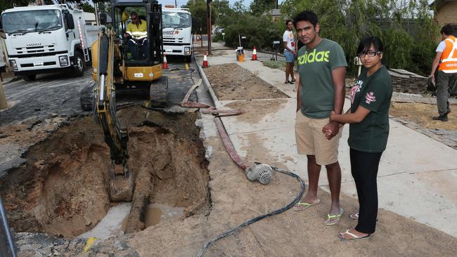 Nithin Mathai and Anjali Thomas-Mathai’s home at Secombe Gardens was damaged when this water main burst overnight.