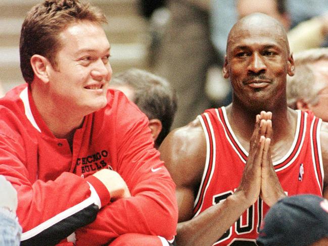 Apr 29 1998 : Chicago Bulls' Luc Longley (L) & Michael Jordan celebrate in East Rutherford  following victory over New Jersey Nets in first round of NBL playoffs.Basketball sport o/seas headshot