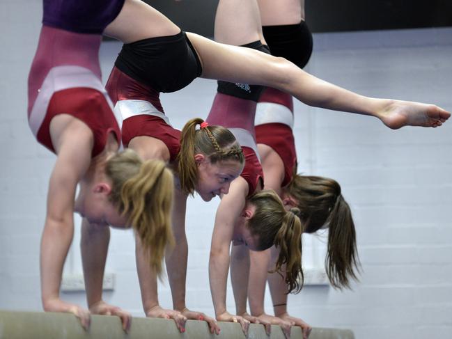 Manly Warringah Gymnastic Club members during a training session. Club CEO Ian Hardy said the new facility would also become a training space for other sports including diving and acrobatics. Picture: Troy Snook