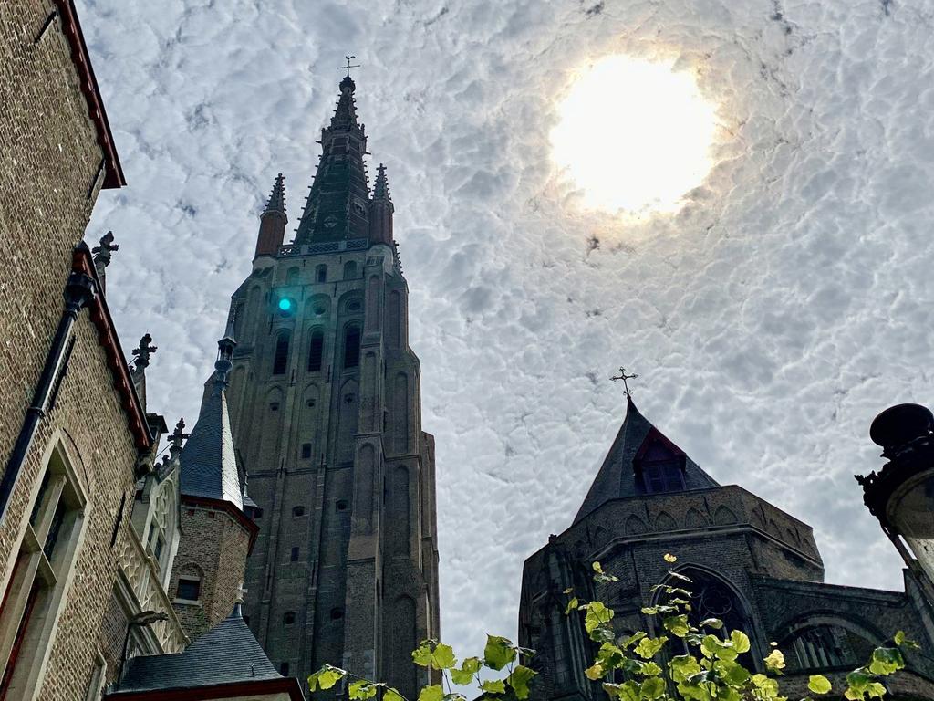 Doron Berlin was on holiday in ancient medieval town Bruges last July when she snapped this incredible sight. Picture: SWNS.