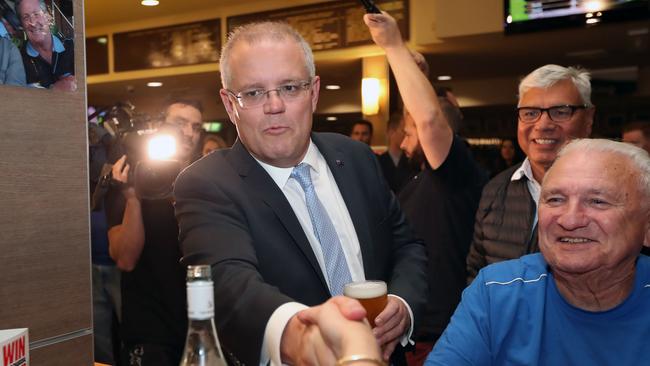 Scott Morrison with Warren Mundine during a visit to the Bomaderry Bowling Club outside of Nowra, NSW. Picture: Gary Ramage