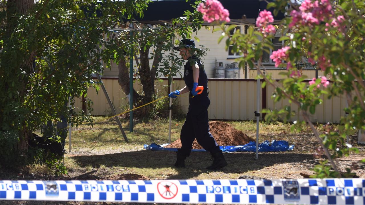 BACK YARD DIG: Investigators excavating the back yard of the Burbank St Address in Chinchilla. Picture: Peta McEachern