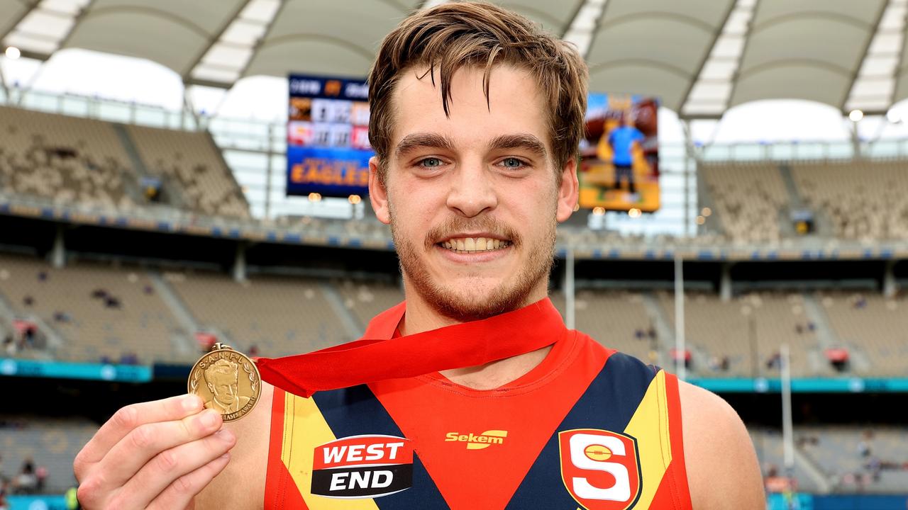Casey Voss with the Fos Williams medal for best SANFL player in Sunday's state clash with the WAFL in Perth. Picture: Paul Kane/Getty Images