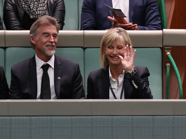 Olivia Newton-John, right, appeared animated as she watched the proceedings. Picture: Kym Smith