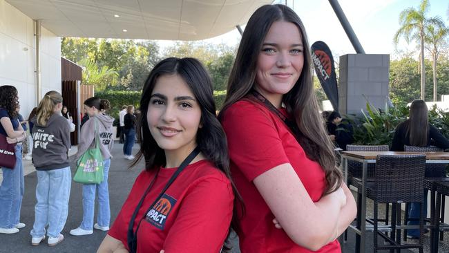 Gold Coast teens Baran Jalilian, 17, and Madison Brennan, 18, at the Impact Youth Summit at the Sea World Resort Conference Centre.