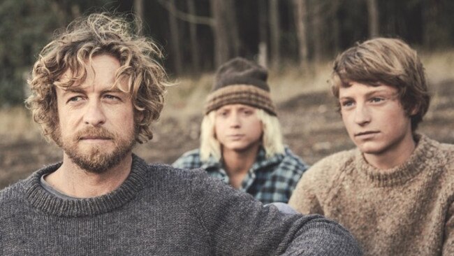 Simon Baker leads two boys onto a risky break in the movie adaptation of Tim Winton’s Breath. Picture: Nic Duncan/ScreenWest