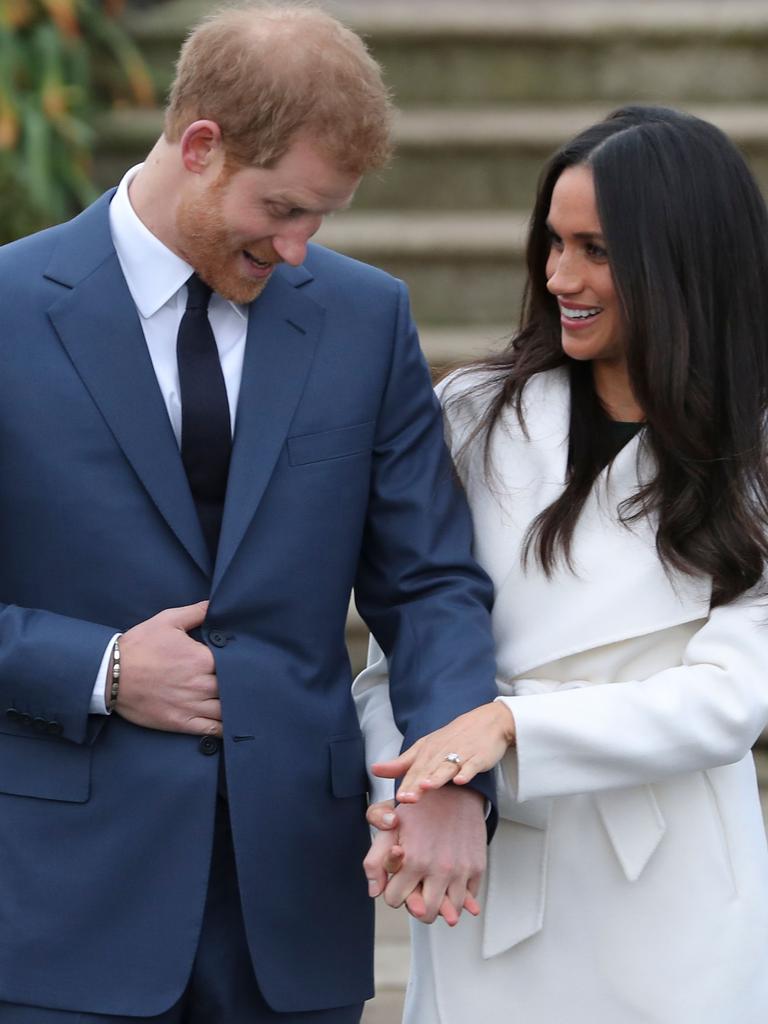 Prince Harry and Meghan showed off the ring during their engagement photo call. Picture: AFP Photo/Daniel Leal-Olivas