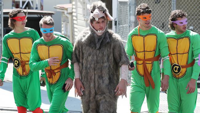 Brisbane players dressed as the Teenage Mutant Ninja Turtles and Splinter. Picture: Liam Kidston