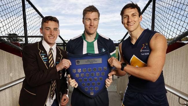 Whitefriars player Lochie Reidy with school alumni and current Melbourne Demons players, Tom McDonald (St Pats) and Sam Weideman for the Herald Sun Shield Grand Final taking place on Wednesday between St Pat's and Whitefriars. Picture: Alex Coppel.