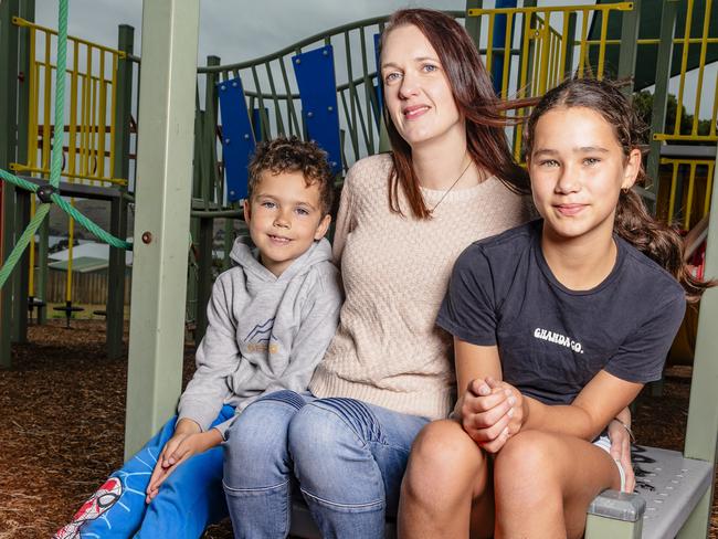 Taro aged 8 and Zita aged 11 with their mum Jessica Yasuda who is worried about the rising costs of sending her children back to school after the summer holidays.Picture: Linda Higginson