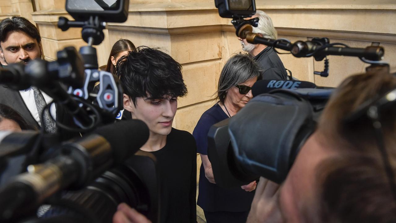 Dhirren Randhawa at the centre of a media scrum as he leaves court on Thursday. Picture: Roy VanDerVegt