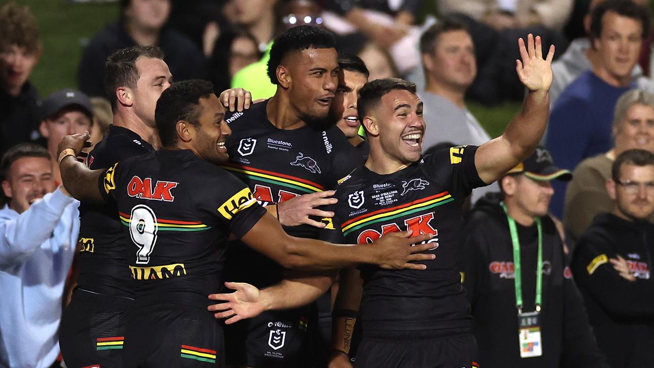 PENRITH, AUSTRALIA - MARCH 10: Stephen Crichton of the Panthers celebrates with team mates after scoring a try, which was later disallowed by the video bunker during the round one NRL match between the Penrith Panthers and the Manly Sea Eagles at BlueBet Stadium on March 10, 2022, in Penrith, Australia. (Photo by Cameron Spencer/Getty Images)