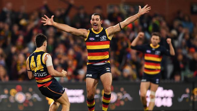 Co-captain Taylor Walker celebrates a goal during the Crows’ success against the Giants at Adelaide Oval. Picture: Mark Brake/Getty Images