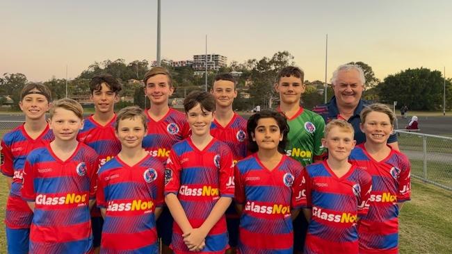 Celebrating their Team of the Week win are Nerang players (back from left) Lincoln Smith, Nixon Prince, Cooper Turner, Blake Flynn, Rylan Rankin, Bryce Roadley (Coach), Thomas Eakin, Ethan Coyte, Chase Rome, Hassan Attalah, Joshua Roadley, Ronan Fry. Absent: Jaxon Goldring