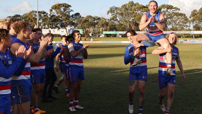 Schiller is chaired off after his 250th SANFL League game for Central District. Picture: David Mariuz