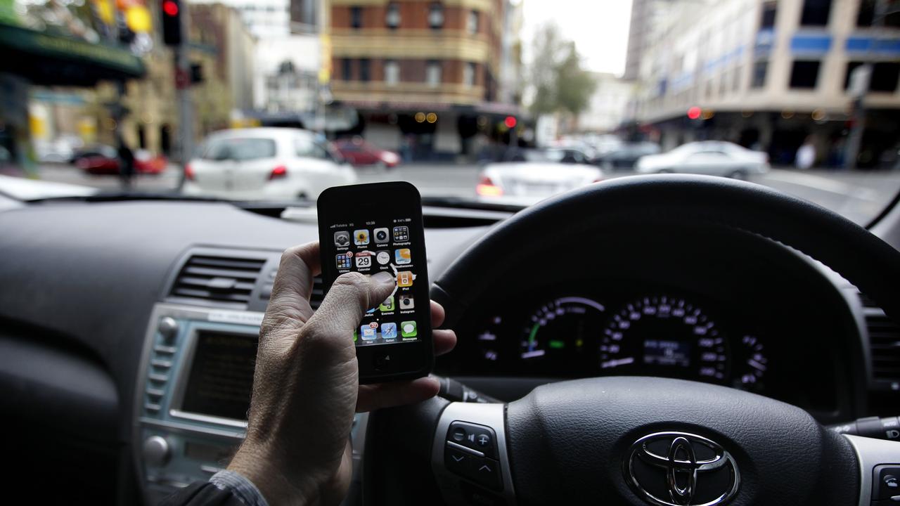 Australians continue to use mobile phones while driving.