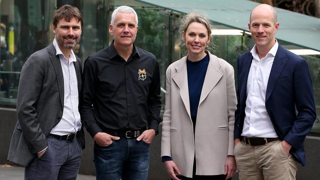 Uber has reached a landmark agreement with the union on minimum pay for drivers and collective bargaining. (L-R) TWU National Assistant Nick McIntosh and National Secretary Michael Kaine with Uber General Manager Dom Taylor and Uber Eats General Manager Bec Nyst. Picture: Jane Dempster/The Australian