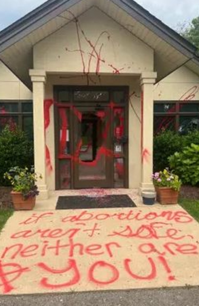 Graffiti in front of the vandalised Mountain Area Pregnancy Services building in Asheville, North Carolina. Picture: Mountain Area Pregnancy Services