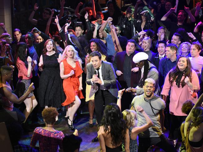 IJimmy Fallon performs during the live opening number on Saturday Night Live, which featured musician Harry Styles and Alec Baldwin and Melissa McCarthy delivering their hit impersonations of Donald Trump and Sean Spicer, in New York. Picture: Will Heath / NBC