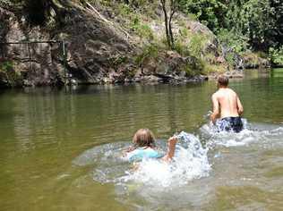 Lauren Le Clerk, Jack McNamara and Joel Le-Clerk enjoy the water hole at Cedar Grove Photo Craig Warhurst / The Gympie Times.