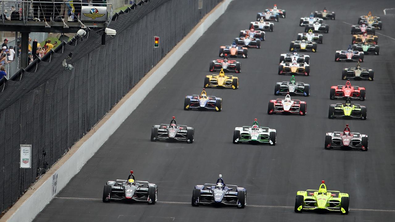 Simon Pagenaud (bottom right) leads the field at the start of the Indy 500 in May.