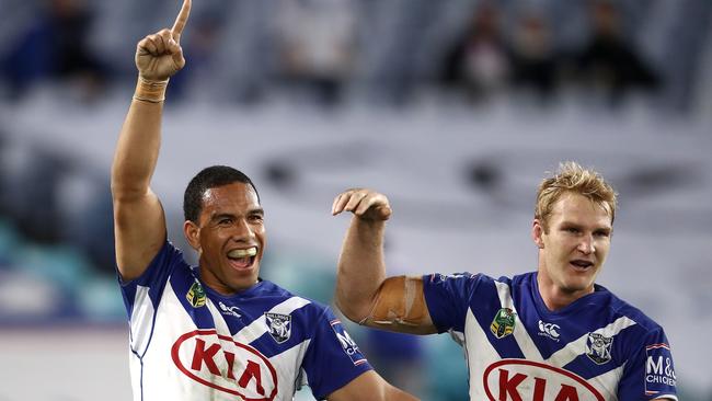 Will Hopoate and Aiden Tolman celebrate a Bulldogs try.