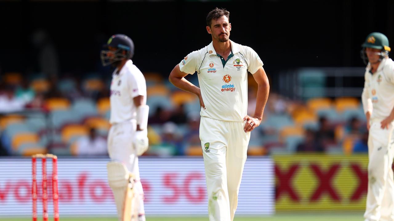 Australia's paceman Mitchell Starc reacts after bowling on day five of the fourth cricket Test match between Australia and India at The Gabba in Brisbane on January 19, 2021. (Photo by Patrick HAMILTON / AFP) / --IMAGE RESTRICTED TO EDITORIAL USE - STRICTLY NO COMMERCIAL USE--