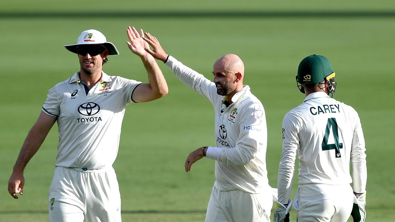 Nathan Lyon (centre) is just about the key man for the Australians right now. (Photo by Bradley Kanaris/Getty Images)