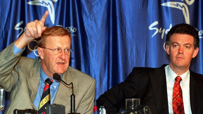 Coates and then NSW Olympics minister Michael Knight hold a press conference in 2000. Picture: Alan Pryke