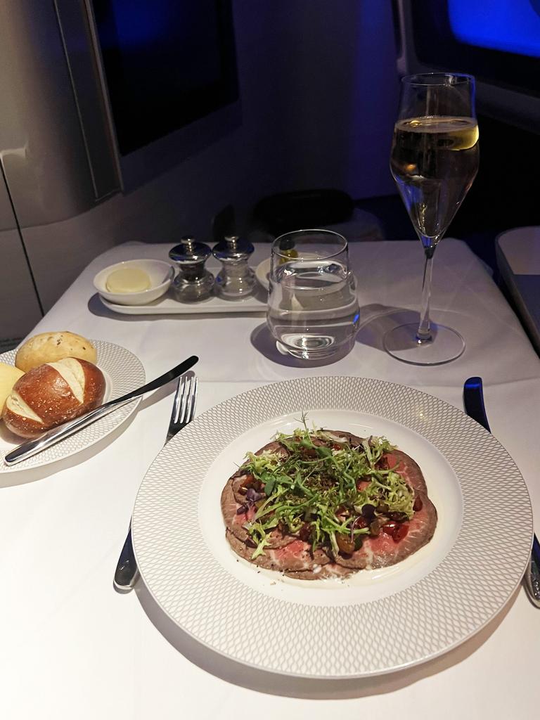 James explains: "I love aeroplane food; and by almost living on planes you get used to it’. Picture: Caters.