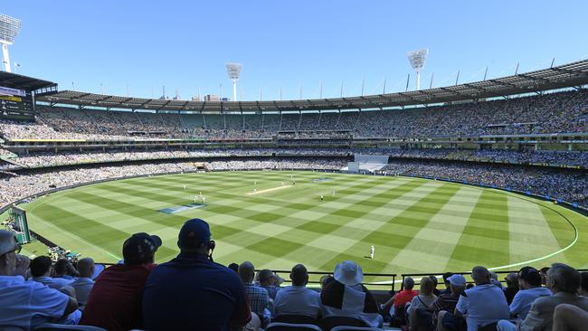 Fan enjoy the cricket on day one of the Boxing Day Test between Australia and England.