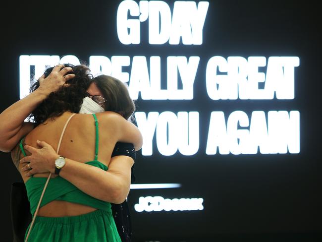 Amanda Moss and Cindy Moss embrace on arrival at Sydney Airport. Picture: Lisa Maree Williams/Getty Images