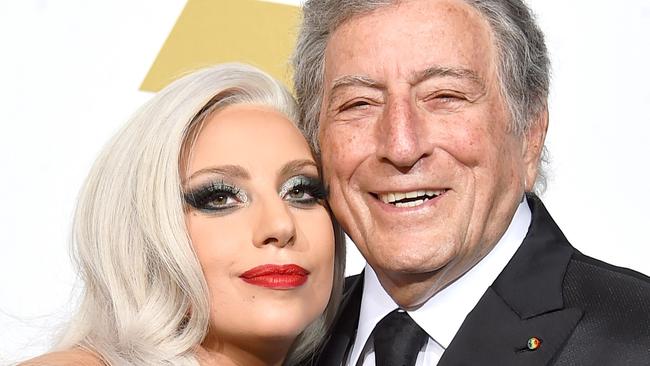 (FILE PHOTO) Singer Tony Bennett dies aged 96 LOS ANGELES, CA - FEBRUARY 08:  Singers Lady Gaga (L) and Tony Bennett, winners of Best Traditional Pop Vocal Album for 'Cheek to Cheek,' pose in the press room during The 57th Annual GRAMMY Awards at the STAPLES Center on February 8, 2015 in Los Angeles, California.  (Photo by Frazer Harrison/Getty Images)