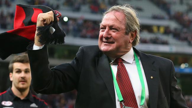 MELBOURNE, AUSTRALIA - APRIL 12: Kevin Sheedy the former coach of the Bmbers waves his scarf after winning the round two AFL match between the Essendon Bombers and the Hawthorn Hawks at Melbourne Cricket Ground on April 12, 2015 in Melbourne, Australia. (Photo by Quinn Rooney/Getty Images)