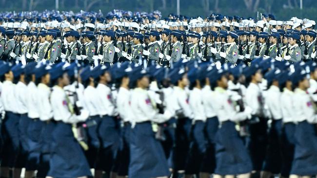 Myanmar junta military soldiers parade during a ceremony to mark the country's Armed Forces Day.