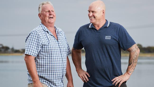 Alan Stringer (left) with SA football giant Scott Hodges, who has helped him overcome his mental illness battles. Picture: Matt Loxton