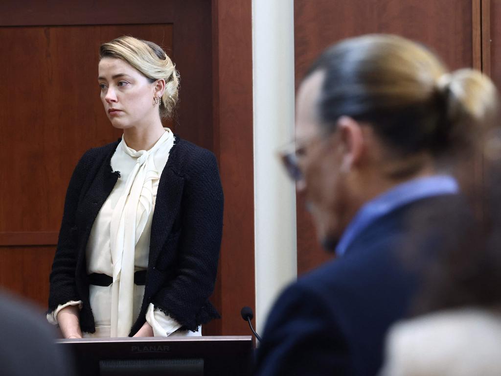 US actress Amber Heard testifies as US actor Johnny Depp looks on during a defamation trial at the Fairfax County Circuit Courthouse in Fairfax, Virginia, on May 5, 2022. Picture: Jim Lo Scalzo / AFP.