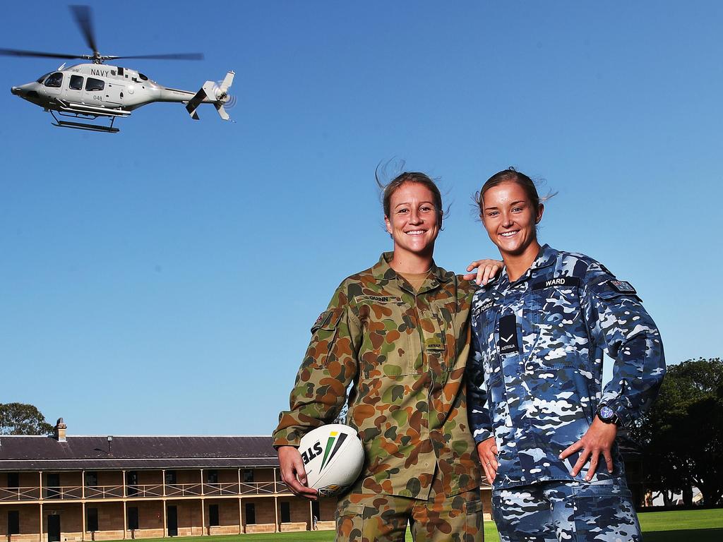 Jillaroos  and serving defence force representatives Talesha Quinn and Meg Ward at the Army Barracks. Picture. Phil Hillyard