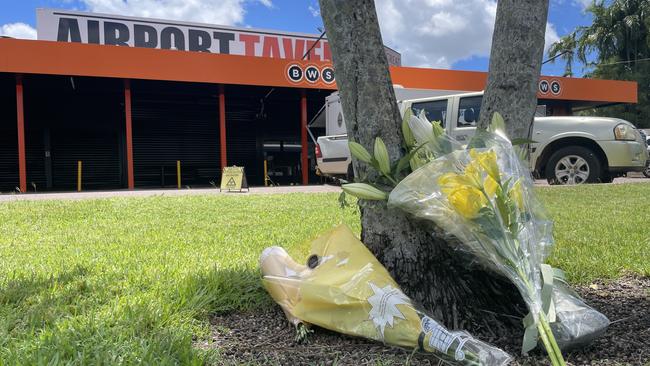 Floral tributes at The Airport Tavern at Jingili in Darwin where a 20-year-old bottleshop worker was stabbed to death about 9pm Sunday, March 19, 2023. Picture: Sierra Haigh