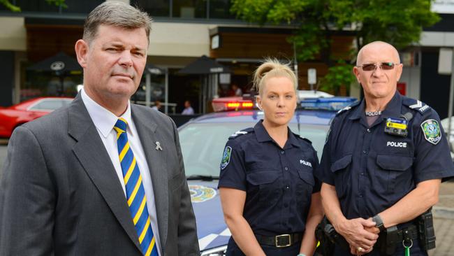 Police Association of SA president Mark Carroll with senior constables Tash Smith and Paul Jelfs, who were both assaulted in the line of duty. Picture: AAP / Brenton Edwards