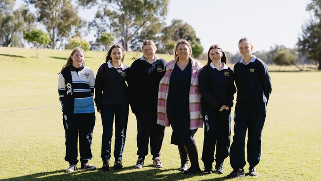 Gilgandra High School students and their teacher are undertaking a groundbreaking initiative to provide free sports bras to their female students to encourage them to participate in sports. Photos: Supplied